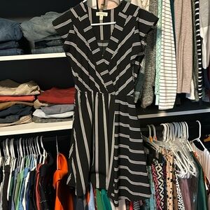 Women’s knee length dress. 100% polyester